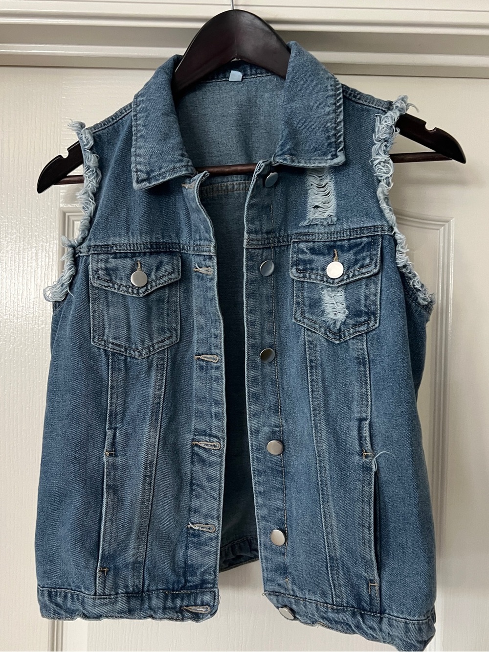 Sleeveless washed denim jacket size small